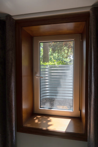 Egress Tilt & Turn window with brown interior trim kit