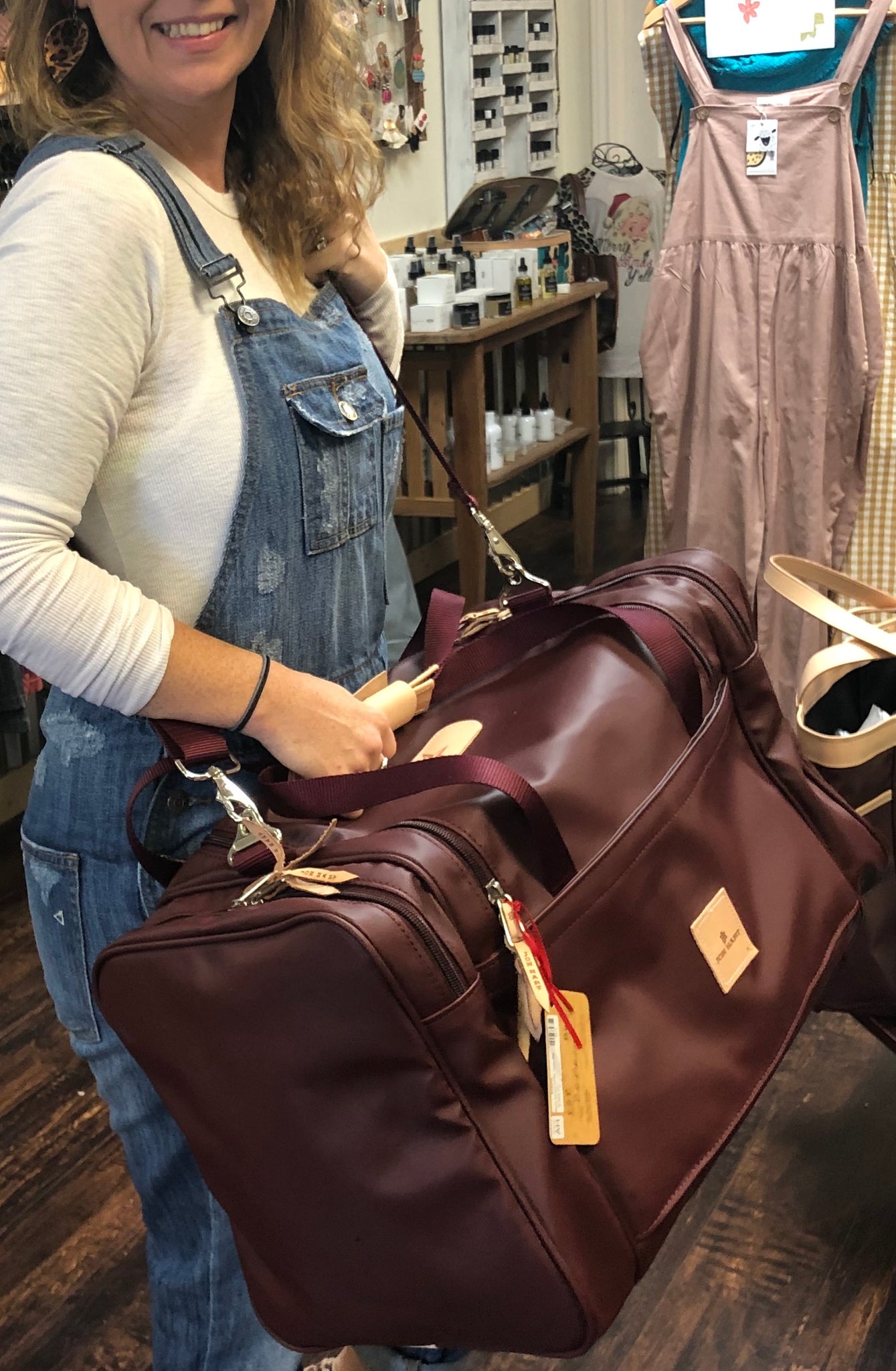 maroon duffle bag