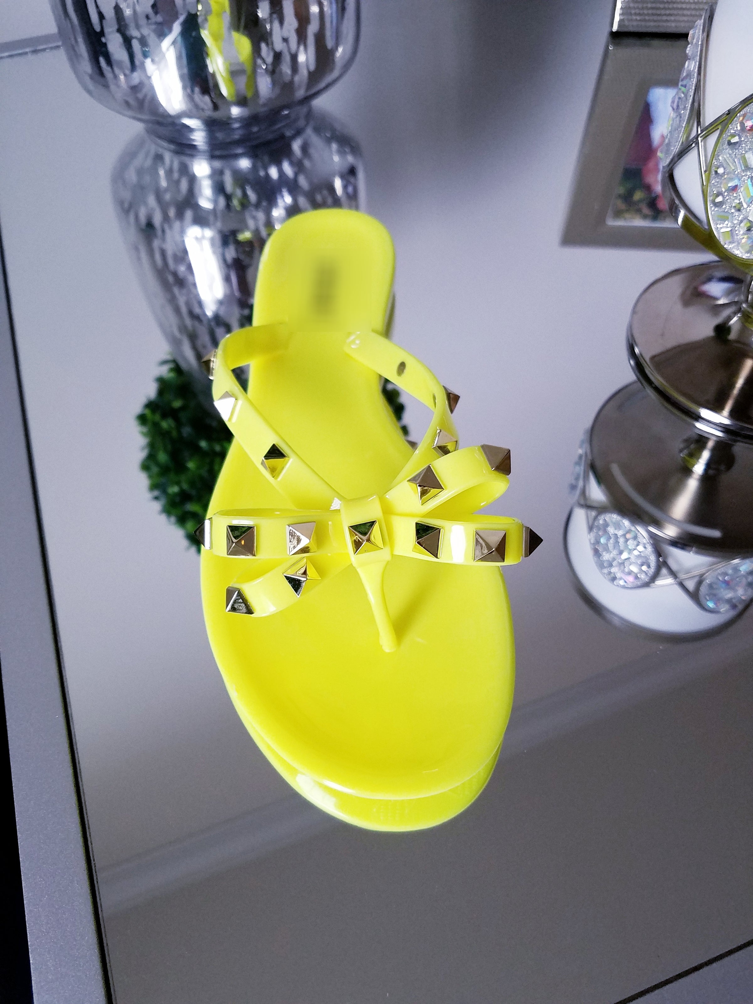 neon yellow flip flops