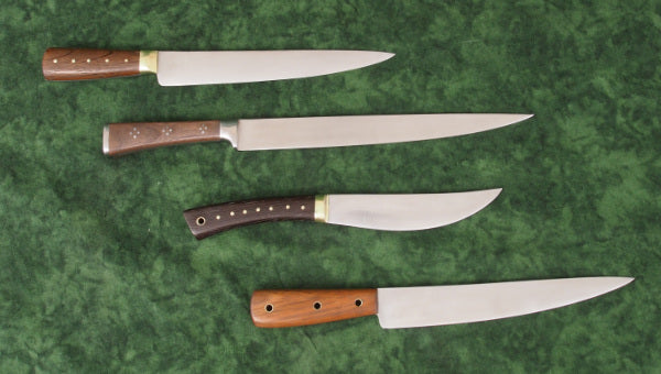 Group of 4 Medieval knives, possibly finished with a bit more polish than period pieces