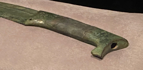 Butt of grip on bronze sword