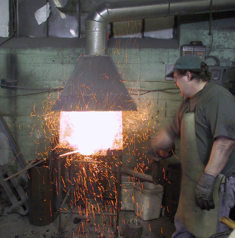 Working the forge at Arms & Armor INc.