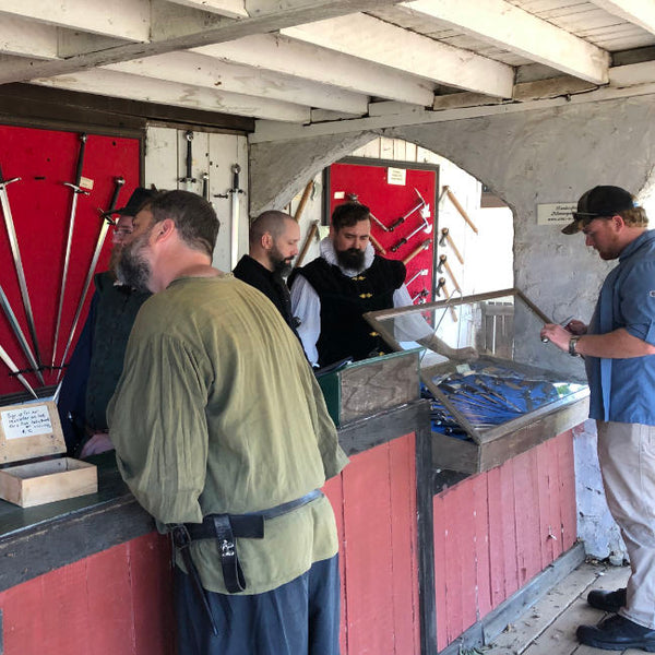 Helping patrons at the Minnesota Renaissance Fair