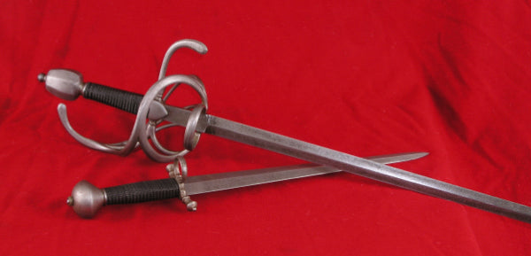 Rapier and Dagger with a finish of a working weapon in harsh conditions, done for a living history venue.. 