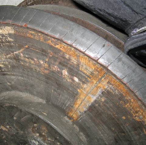 Treated polishing wheel with grit applied to leather. Photo by Peter Johnson