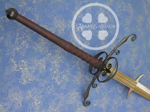 Two Handed sword with side rings with decorative detail.
