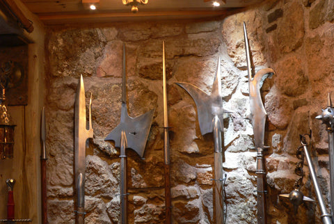A guard room in domestic castle man cave pole arm detail shot.