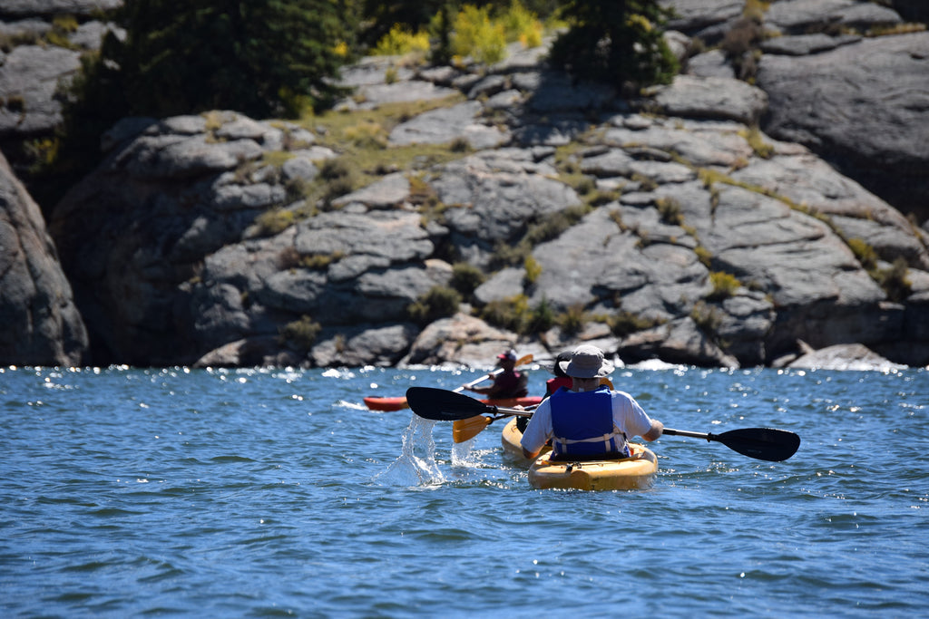 Kayaker paddling in the sea