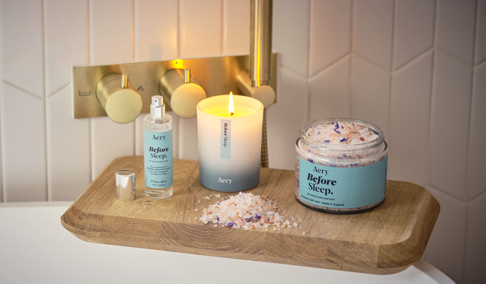 before sleep bath salt, candle and pillow mist displayed in bathroom setting