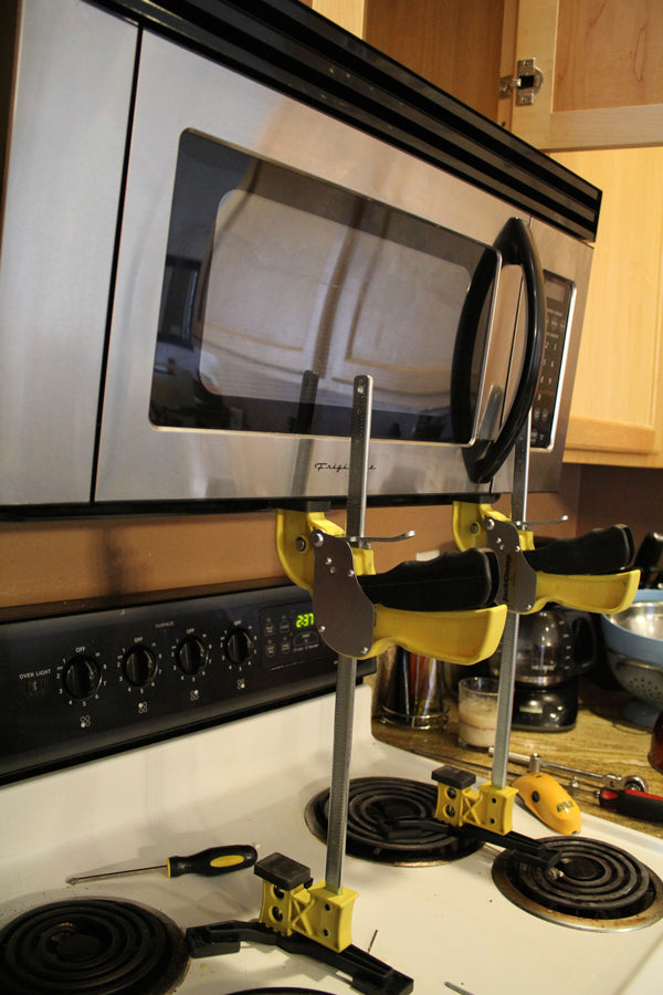 Install an over-the-range microwave oven