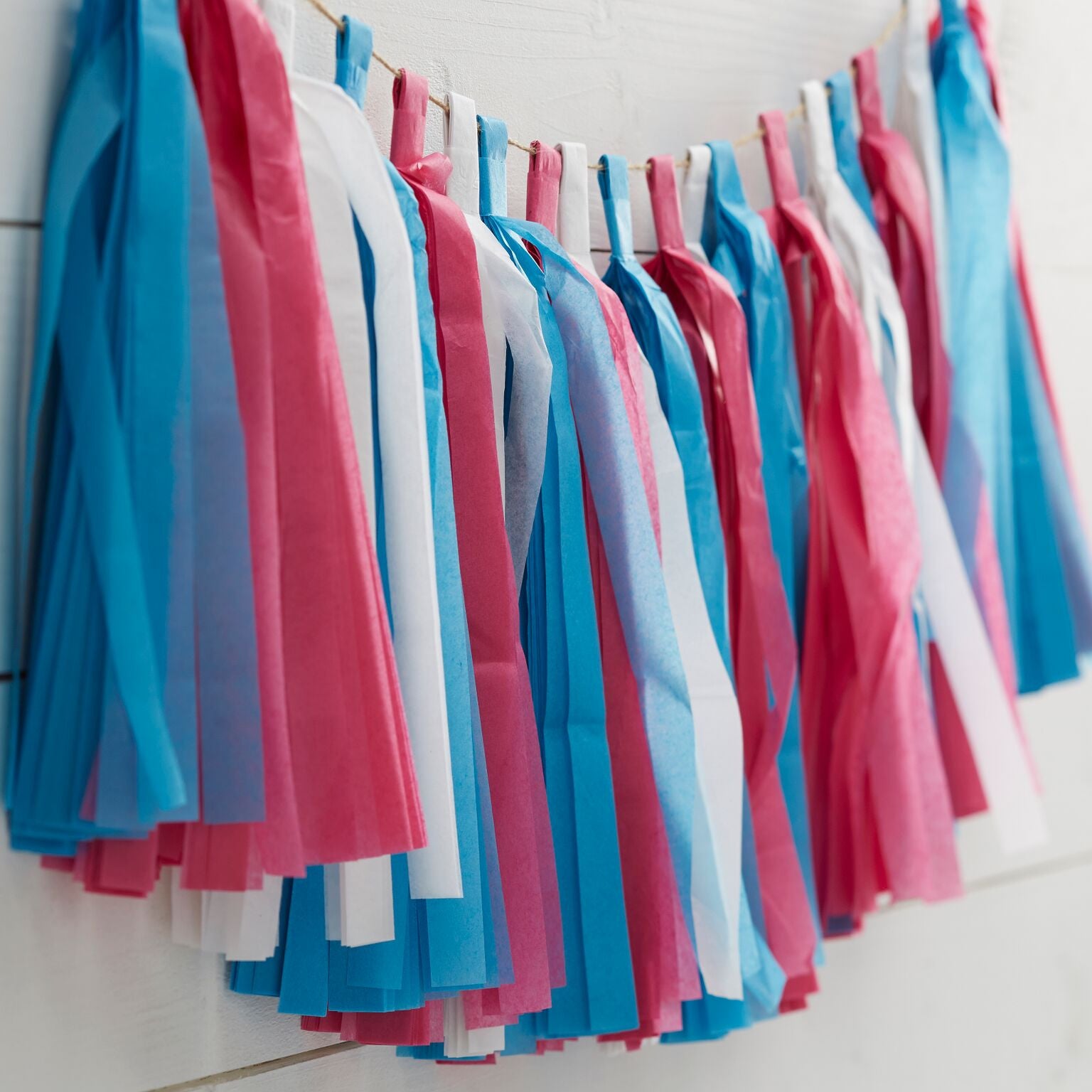 pink and blue tassel garland