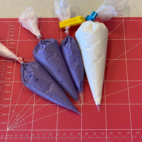 Piping bags filled with Royal icing