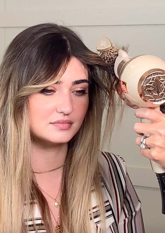 how to style curtain bangs with flat iron