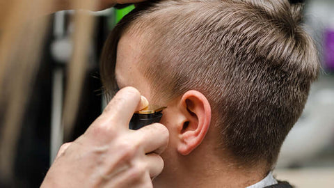 trimming sideburns on men's hair cut