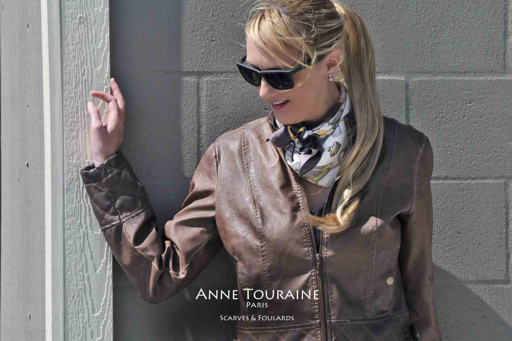 French silk scarves by ANNE TOURAINE Paris™: Brown and white Fashion Accessories scarf tied as a kerchief over a leather jacket