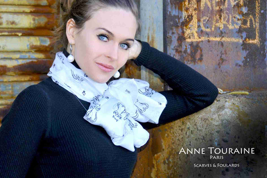 Chiffon silk scarves by ANNE TOURAINE Paris™: light grey cat pattern scarf tied with a fluffy bow