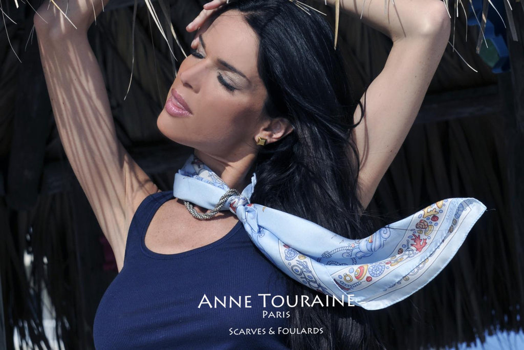French silk scarves by ANNE TOURAINE Paris™: Nautical blue scarf as a neck scarf intertwined with a silver chain