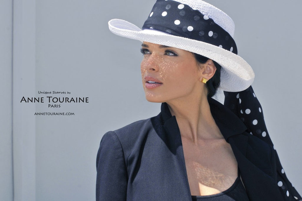 Chiffon silk scarves by ANNE TOURAINE Paris™: black polka dot scarf tied around a white panama hat