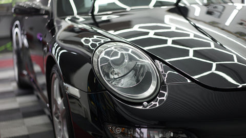 front side view of porsche carrera 4s at carstudios