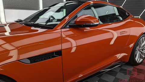 2016 Jaguar F-Type in Orange side mirror