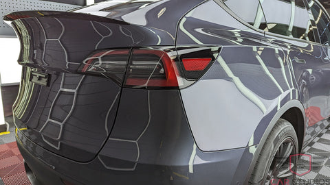 2023 Tesla Model Y / Grey + White Interior Back Right