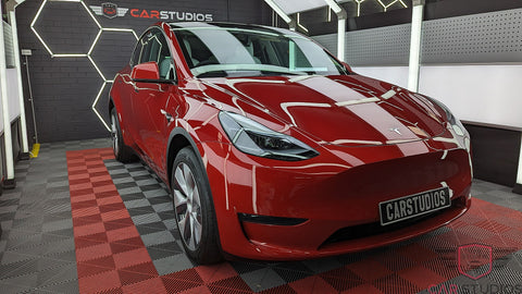 2023 Tesla Model Y / Red Left