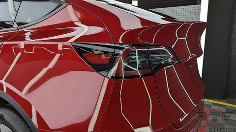 2023 Tesla Model Y / Red Rear Left