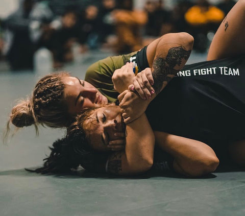 Athlete Sav Wright competing in a No Gi tournament.