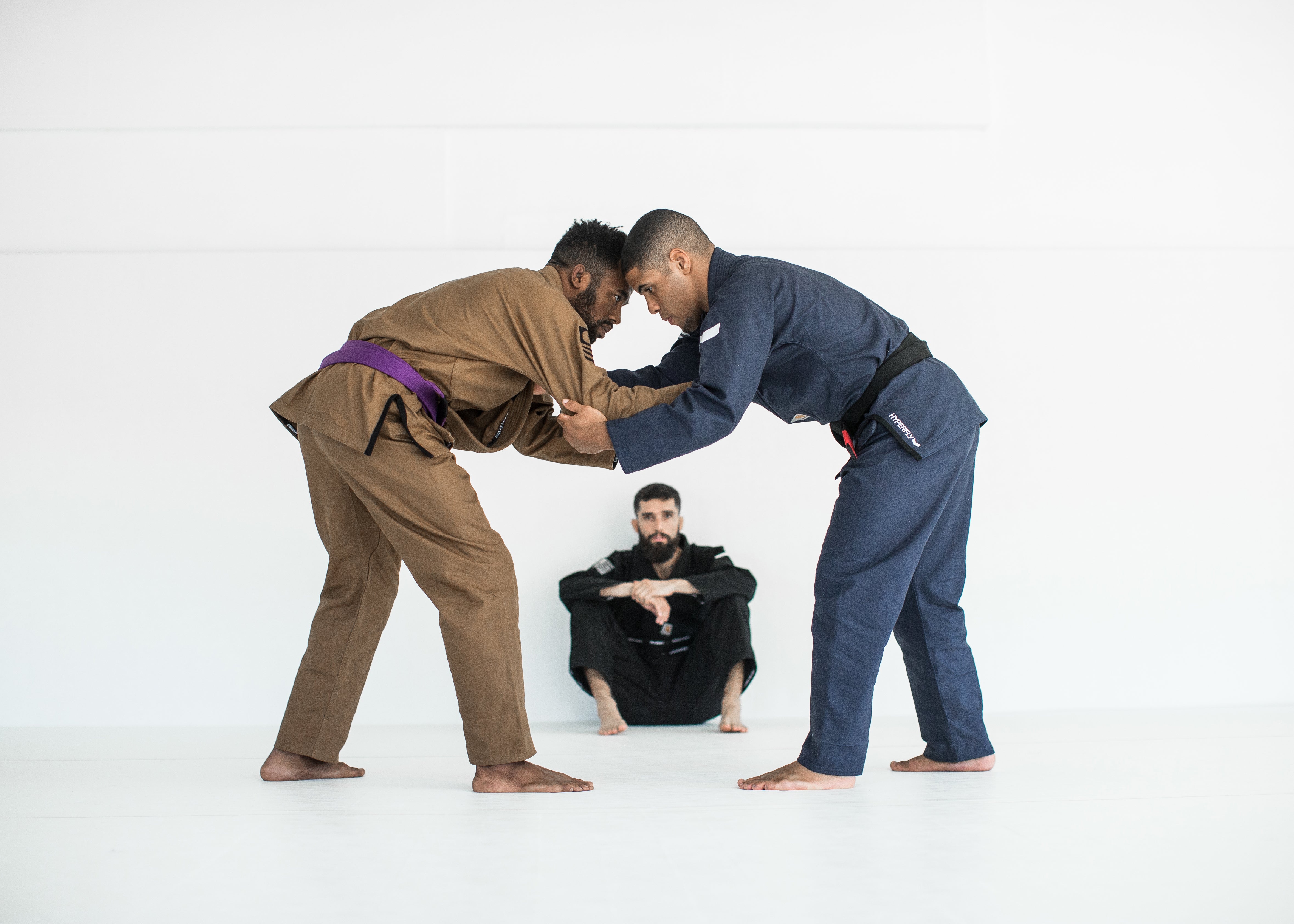 Two black belt athletes in the hyperfly + jordan Gis demonstrating self defense.