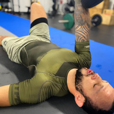 Athlete Leonardo Delgado stretching.