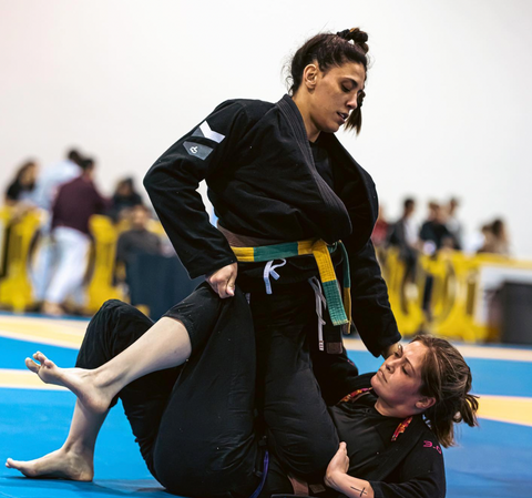 Athlete Samantha Hall competing in a jiu-jitsu competition.