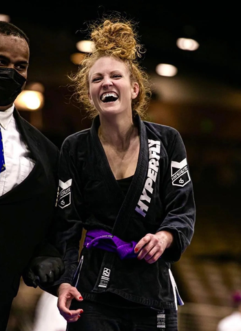 Sa’idah Durkee smiling at a Jiu Jitsu competition.