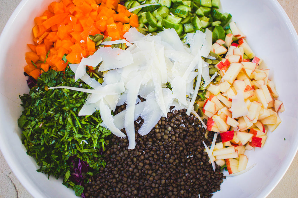 Pueblo Chili Co hearty kale salad with a spicy cherry dressing