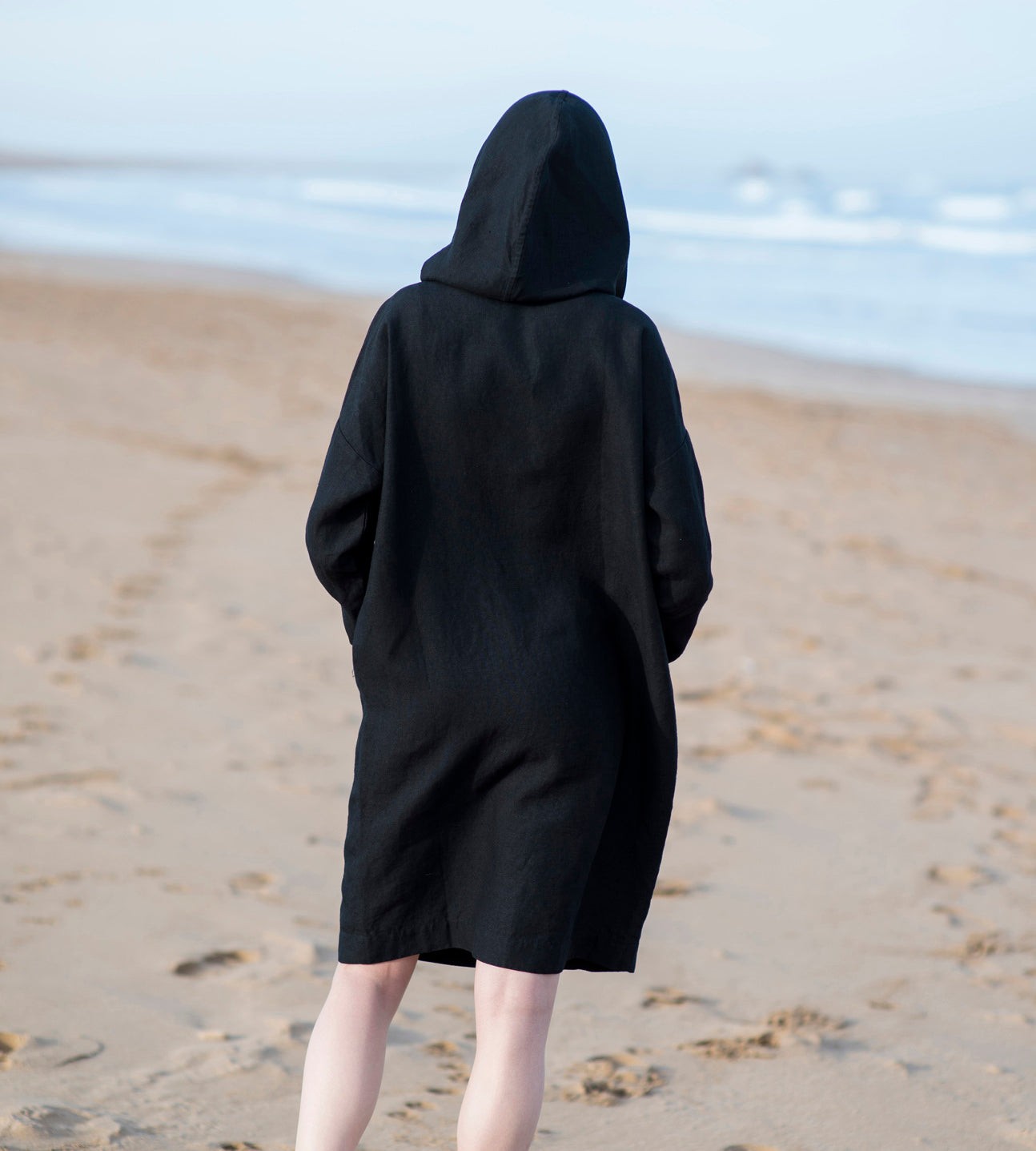 black dress on beach