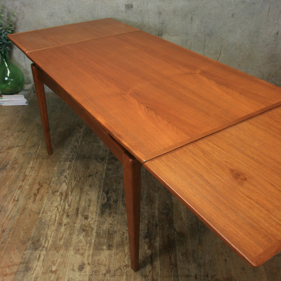 teak extension dining table        <h3 class=