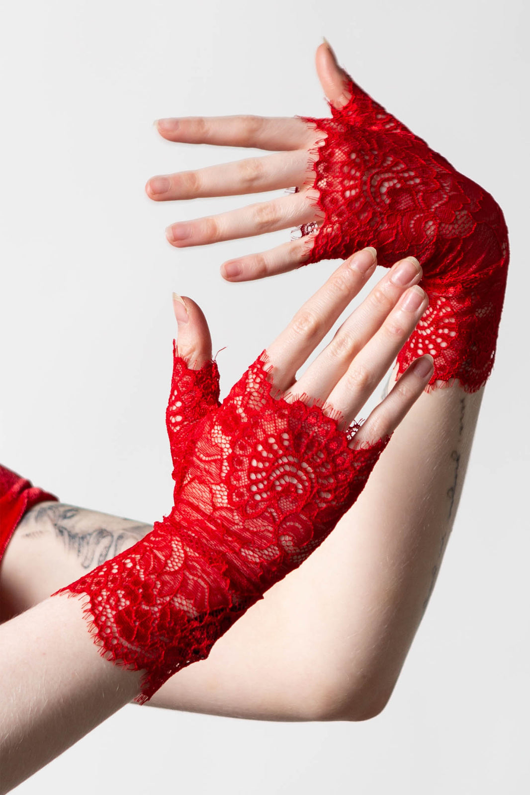 fingerless red lace gloves