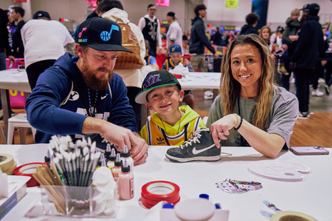 A Family Customizing Sneakers with Angelus Products at JSM 801 Customs Sneaker Customization Event at the NBA Crossover
