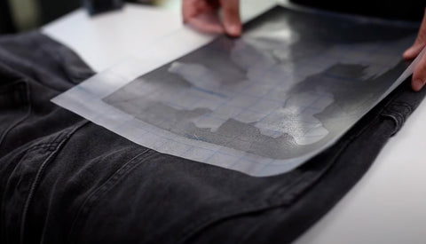 placing Stencil on denim