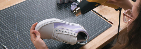 Heat setting a canvas shoe painted with Angelus Paint and 2-Soft