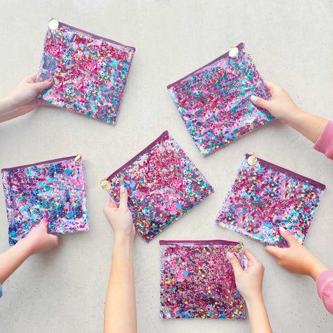 6 cute pink and sparkly pouches ready for a party