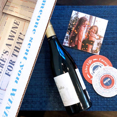 wine, box, coasters and card with two ladies