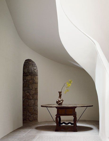 I was fixated on this gorgeous staircase by Axel Vervoordt, and asked for something as elegant and sweeping for the front hall. Photo by Laziz Hamani for Architectural Digest.
