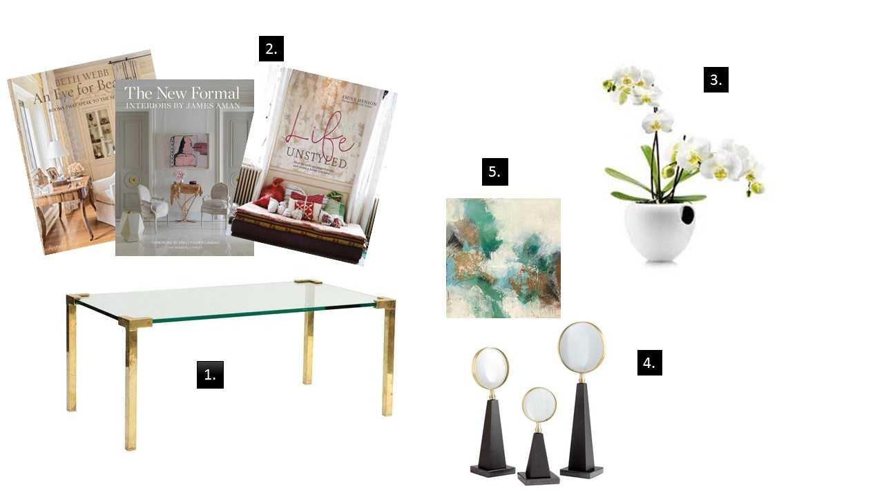 Elements of a copy table: 1. start with a sleek 1970s brass and glass <a href="https://huffharrington.com/collections/furniture/products/peter-ghyczy-brass-and-glass-signed-coffee-table" target="_blank">coffee table</a>. 2. Add your foundation with <a href="https://huffharrington.com/collections/books" target="_blank">coffee table books</a>. 3. Go for the green with a pretty floral or orchid arrangement. 4. Add some height with a set of three chunky and cool <a target="_blank" href="https://huffharrington.com/collections/decor/products/introspection-sculptures">magnifiers.</a> 5. Add the personal touch with a little painting (this one by <a href="https://huffharrington.com/collections/melissa-payne-baker/products/melissa-payne-baker-emerald-joy" target="_blank">Melissa Payne Baker</a>
