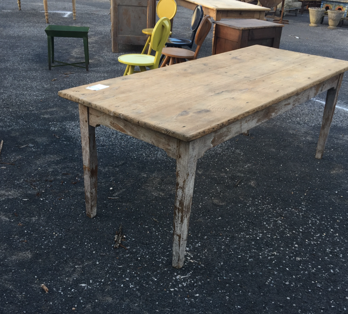 We zeroed in on this <a target="_blank" href="https://huffharrington.com/collections/furniture/products/stripped-oak-table-1">crunchy farm table</a>, imagining it being used one day like this: