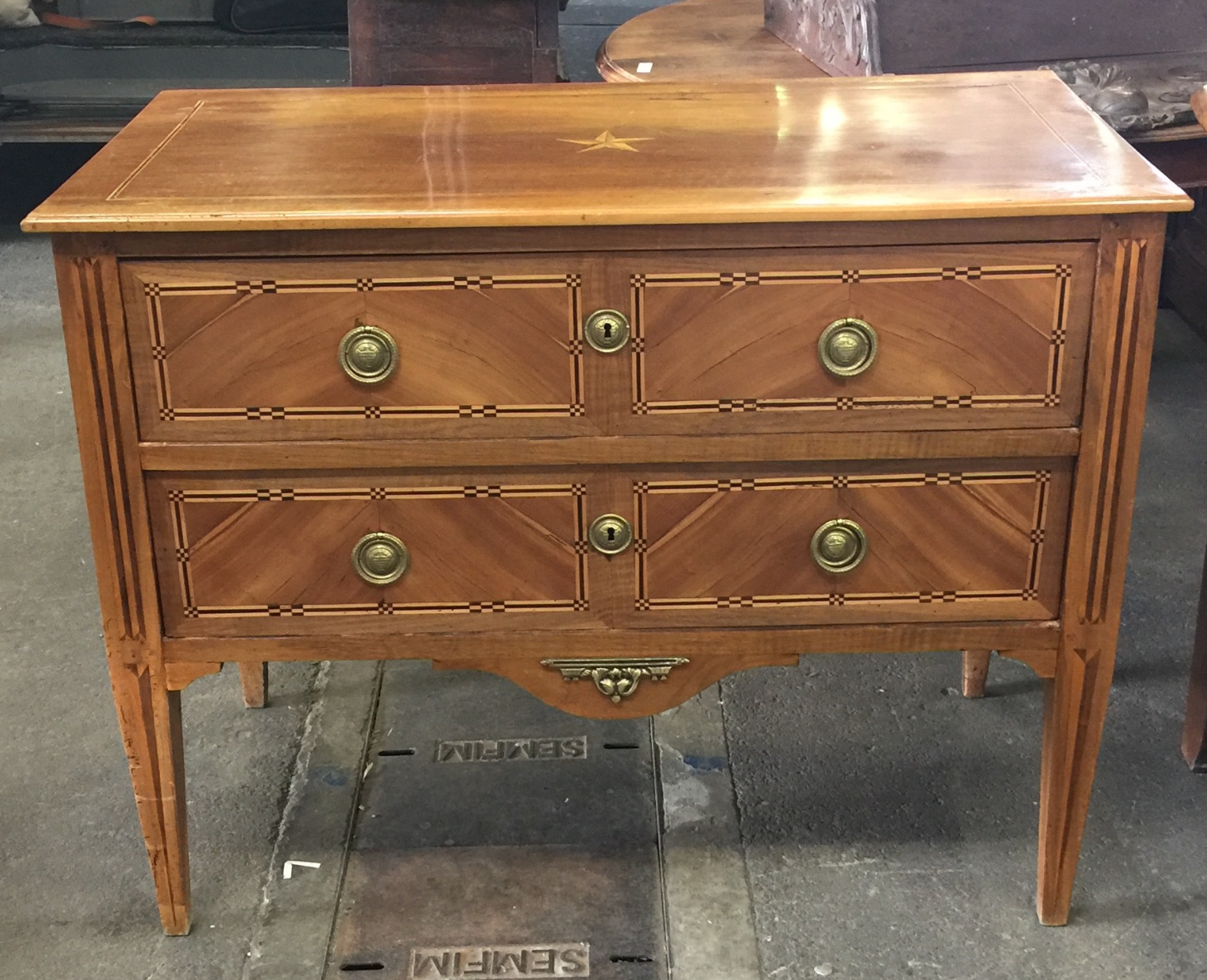 A beautiful <a href="https://huffharrington.com/collections/furniture/products/louis-xvi-commode-with-noyer-marquetry" target="_blank">Louis XVI sauteuse</a>. We said oui, oui, oui.