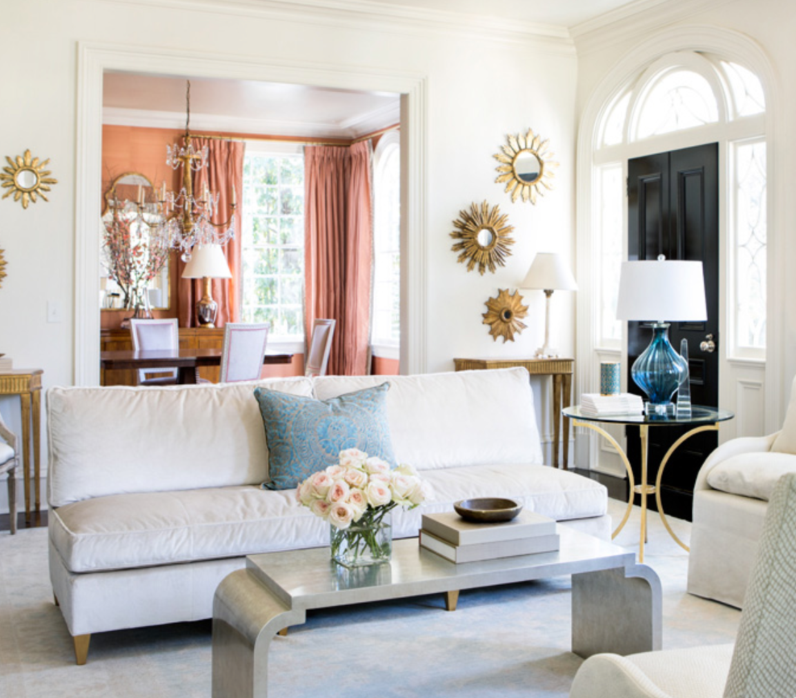 <a target="_blank" href="http://suzannekasler.com/">Suzanne Kasler</a>, who always styles so beautifully, used similar coffee table books to ground this neutral coffee table. <a href="http://atlantahomesmag.com/article/jewel-box-beauty/" target="_blank">Atlanta Homes and Lifestyles</a>, photos by Erica Dines.