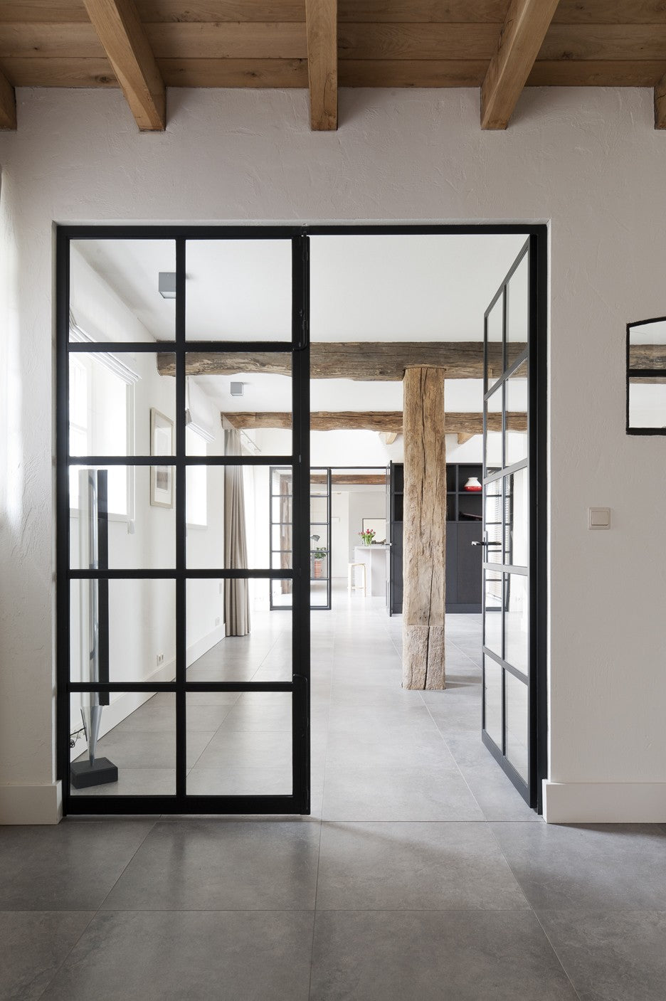 I loved the open feeling of this enfilade, and was inspired by the beams, the floors and the wrought iron windows. From architect-web-nl. on Pinterest.