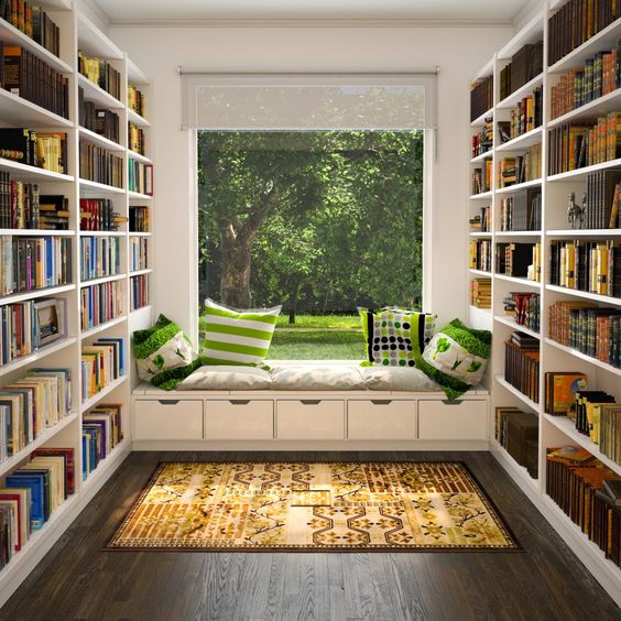 Upstairs, there is a small landing between the bedrooms where I wanted a library and a reading nook, overlooking the view, just like this one from tinyhousedesign.com.