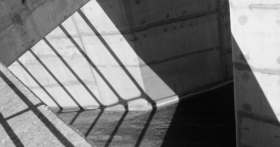 Shadows on cement-Unsplah-Margarida CSilva