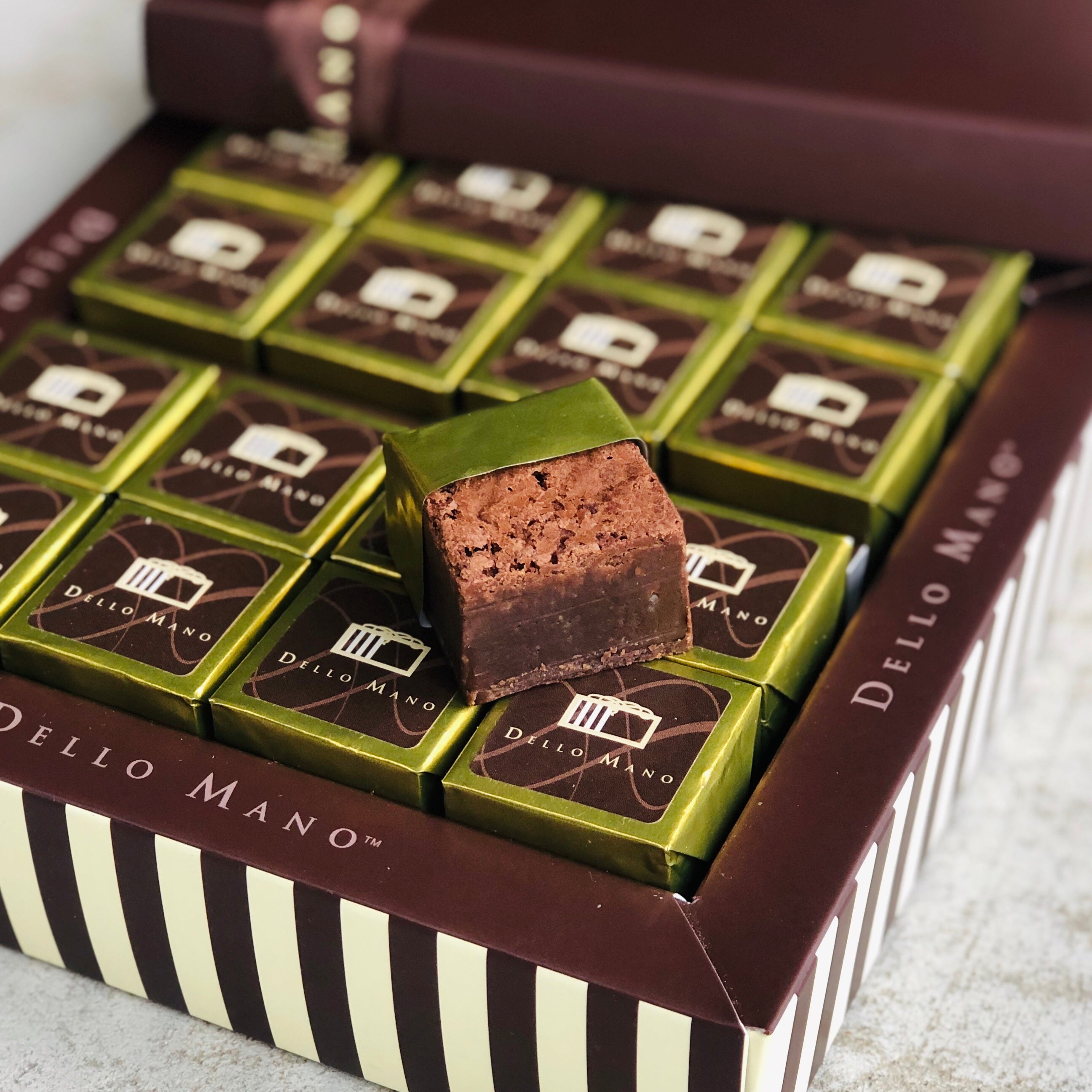 A gift box of Dello Mano individually foiled brownies